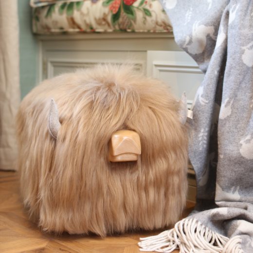 Highland Cow Footstool in Butterscotch Highland cow footstool in butterscotch