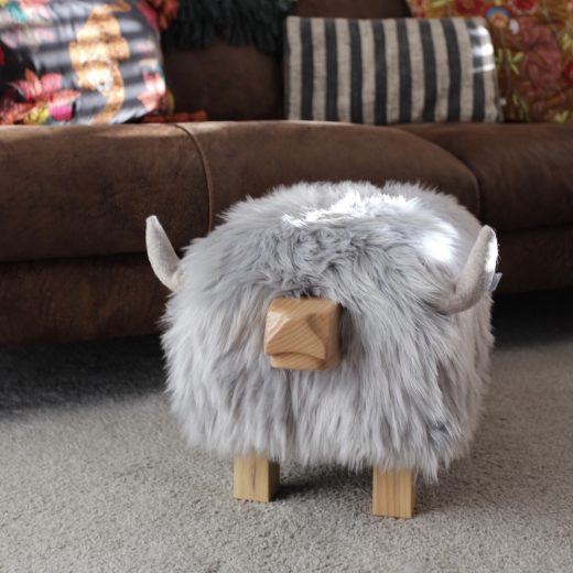 Highland Cow Footstool in Faux Grey Highland cow footstool in faux grey
