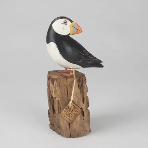 Hand carved small preening puffin sculpture by Originals International Ltd